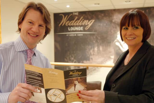 Simon Scott general manager of Leslie Cass with Cheryl Cutts in the new Wedding Lounge at the shop pictured in 2011