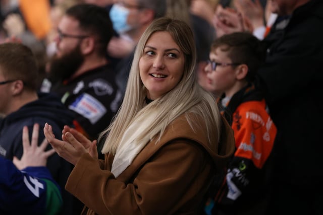 A Sheffield Steelers fan applauds the home side at Utilita Arena