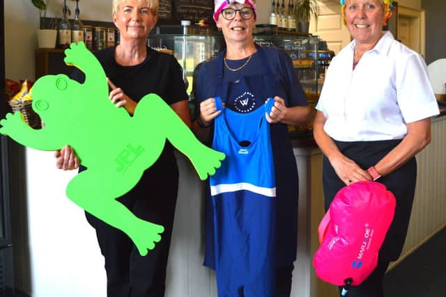 Catering assistants Emma Myers, Pam Bower and Sharon Scanlon are swimming for Big House Heroes