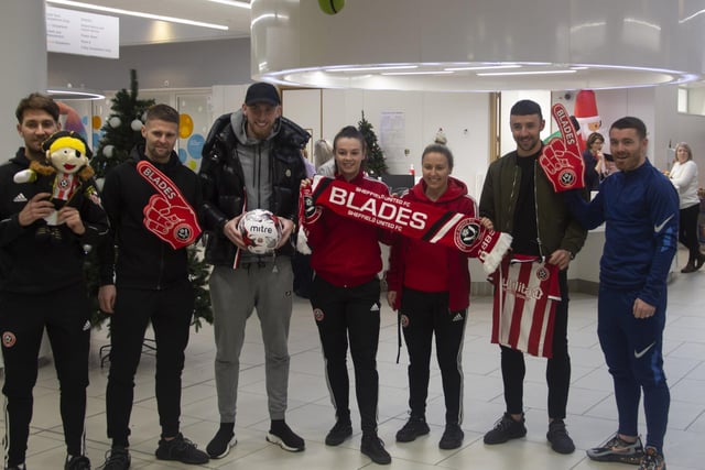 Players and staff from United during their visit to Sheffield Children's Hospital last Christmas.