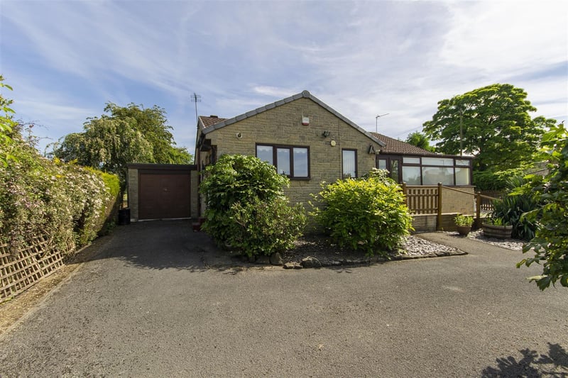 Zoopla says: "With plenty of off-street parking, a garage and a good-sized, well-maintained plot, this property would suit a retiree or family."