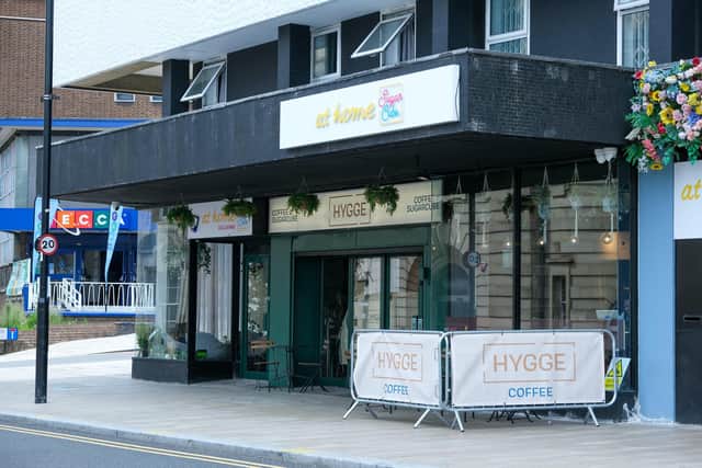 Hygge Cafe owner Alex Moore has been praised for defending a member of staff for wearing the hijab