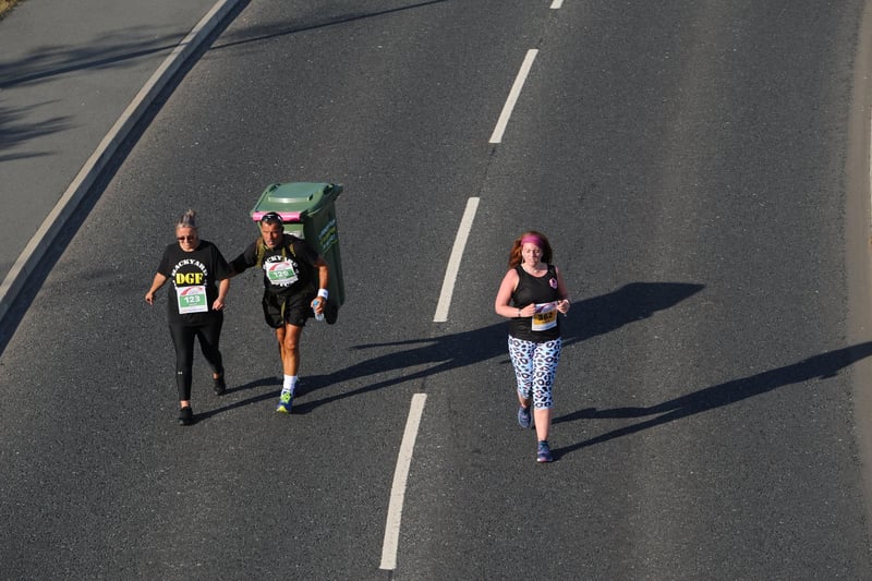 Runners cross the Northern Spire Bridge as they take part in Sunderland City Runs 5k event.