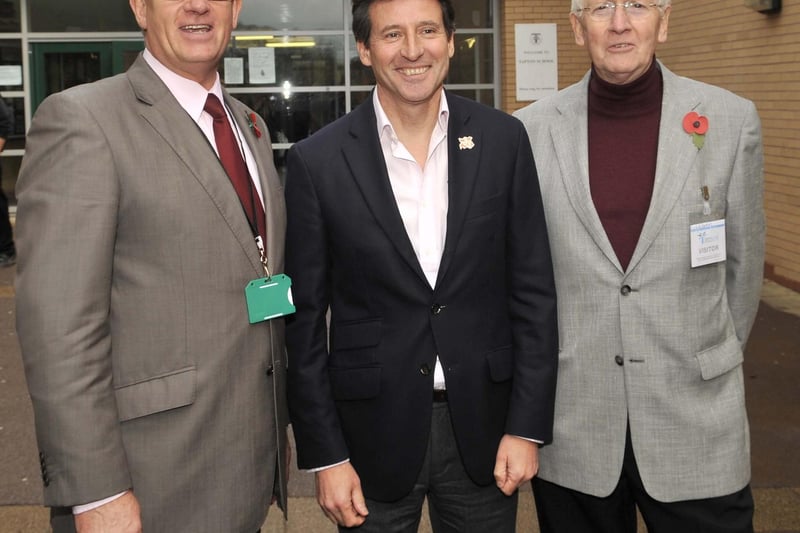 Former Olympian and politician Seb Coe (now Lord Coe) meeting his old teacher David Jackson, right, and headteacher David Bowes on a visit to his old school Tapton in April 2011