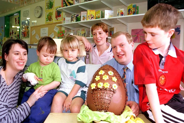 Doncaster Children's Hospital Rainbow Ward was presented with an Easter Egg by Edenthorpe Village Inn manager Chris Guest in 1998. Lookking on are, from left, Sue Broom and her son Corey, aged two, of Bessacarr, Amanda Taylor, aged four, of Askern, nursery nurse Jane Allen and Ashley Quinn, aged ten, of Rossington.