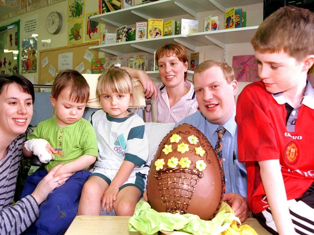 Doncaster Children's Hospital Rainbow Ward was presented with an Easter Egg by Edenthorpe Village Inn manager Chris Guest in 1998. Lookking on are, from left, Sue Broom and her son Corey, aged two, of Bessacarr, Amanda Taylor, aged four, of Askern, nursery nurse Jane Allen and Ashley Quinn, aged ten, of Rossington.