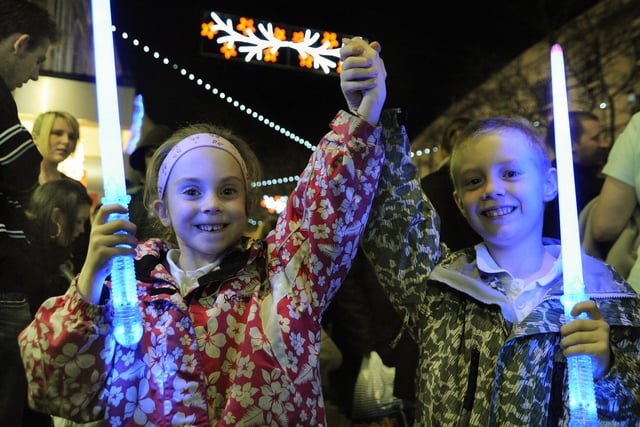 Rowan Hawkins (six) and Jack Hawkins (seven) from Eastney, enjoying the Christmas lights show in Commercial Road, Portsmouth in 2008.
Festive switch-on of the City Centre Christmas Lights in Commercial Road, outside Debenhams near the Jubilee Fountain and inside the Cascades Shopping Centre. 
Picture: Michael Scaddan (084638-0283)