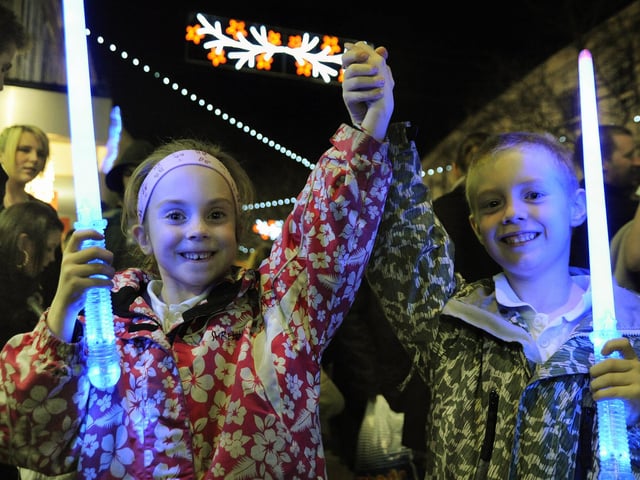 Rowan Hawkins (six) and Jack Hawkins (seven) from Eastney, enjoying the Christmas lights show in Commercial Road, Portsmouth in 2008.
Festive switch-on of the City Centre Christmas Lights in Commercial Road, outside Debenhams near the Jubilee Fountain and inside the Cascades Shopping Centre. 
Picture: Michael Scaddan (084638-0283)