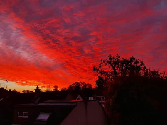 A dramatic blood-red sky filled the air with menace in West Edinburgh this morning.