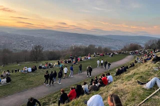 Crowds ignore lockdown rules to gather to watch the sunset at Bolehills Crookes.