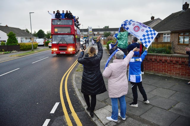Hartlepool United fans celebrate as the promotion bus tour arrives at the Fens earlier this year.