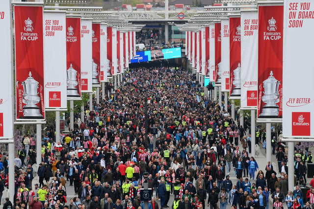 LONDON, ENGLAND - APRIL 22: A general view of fans arriving on Wembley Way prior to the FA Cup Semi Final match between Manchester City and Sheffield United at Wembley Stadium on April 22, 2023 in London, England.