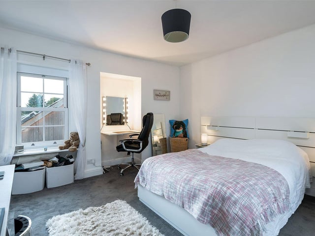 One of the four bedrooms.