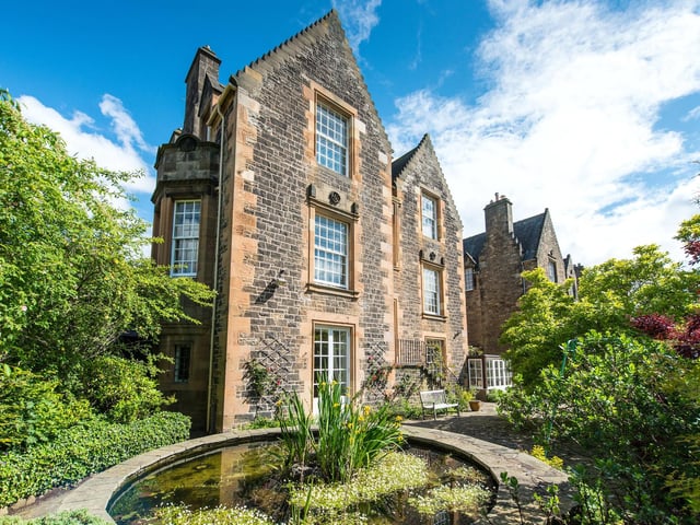The pond is situated near the house at the top of the fairytale garden