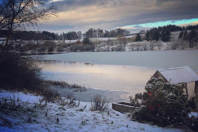 This photo of a partly frozen lake was taken by Dolly Roberts.