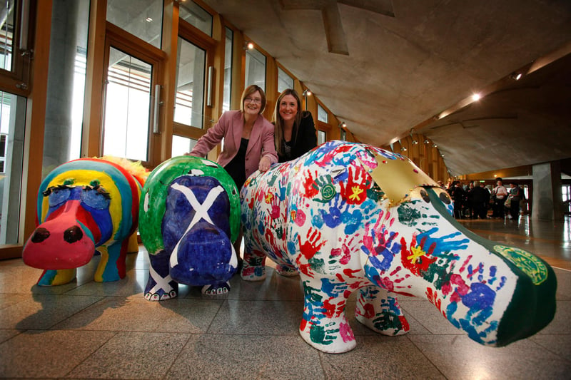 Glenrothes' famous hippos went to the Scottish Parliament - pictured are Presiding Officer Tricia Marwick MSP and Anna Bluman, from the Kingdom Centre,