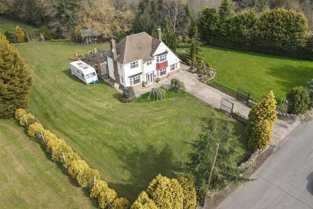 Drone footage shows the idyllic rural setting of the detached family house at Woolley Moor.