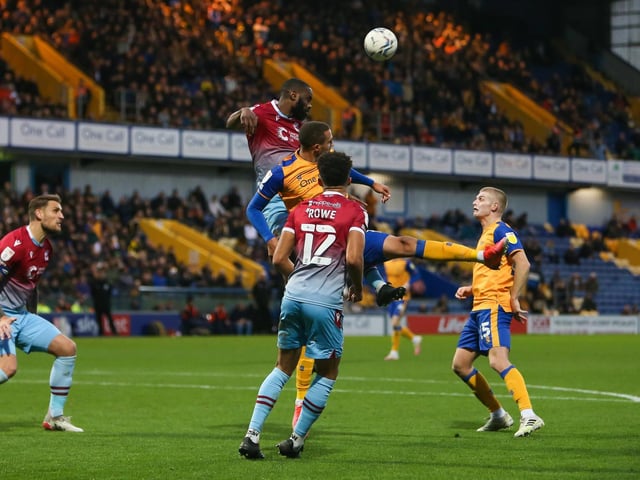 Jordan Bowery challenges in the air.