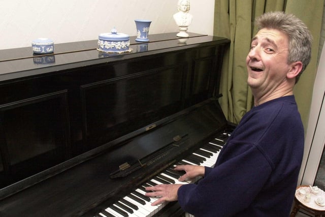 Chris Wintle pictured  at his piano in 2000