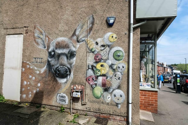 Between the Naked Ape store and Sharrow Vale Kitchens & Bathrooms is this charming mural of a deer with leaking some colourful thoughts by artist Colourarti, created in 2014.