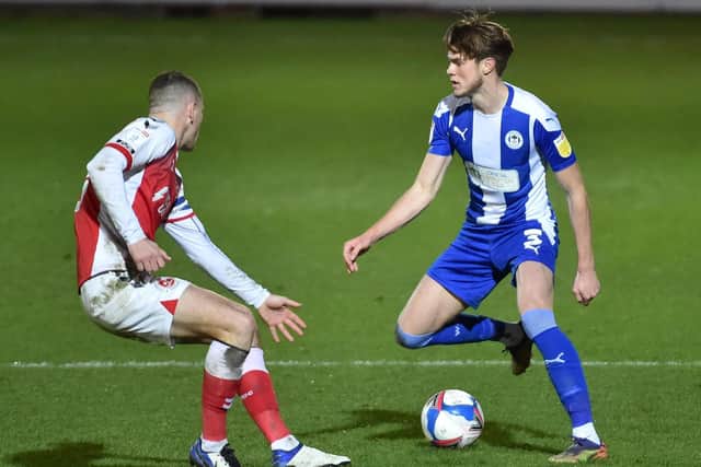 Wigan Athletic defender Tom Pearce has been linked with a move to Sheffield Wednesday.