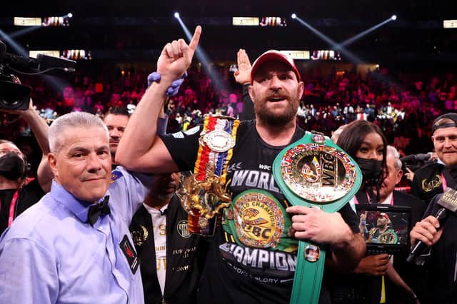 Tyson Fury celebrates his 11th round knock out win against Deontay Wilder after their WBC heavyweight title fight at T-Mobile Arena on October 09, 2021 in Las Vegas, Nevada. (Photo by Al Bello/Getty Images)