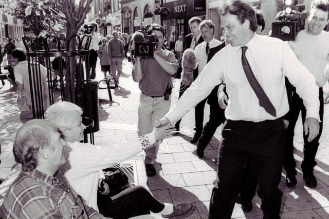 Tony Blair, then Labour leader and future Prime Minister, meets shoppers on Kirkcaldy High Street in 1996