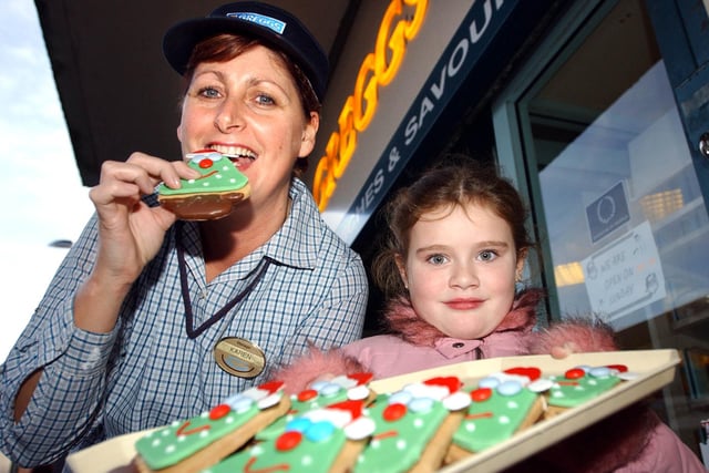 What a day for 7-year-old Charlotte Potts in 2004 when she won a Greggs competition to design a biscuit. Here she is with Karen Batley, the manager of Greggs in Union Street.