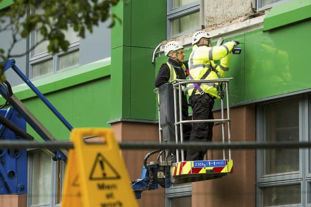Cladding on the Hanover Tower block in Sheffield, South Yorkshire, was taken down after it failed a fire safety test. Sheffield Council said a single element of covering on the Hanover tower block in Exeter Drive, Broomhall, failed the inspection. June 27 2017. Picture: Benjamin Paul/SWNS