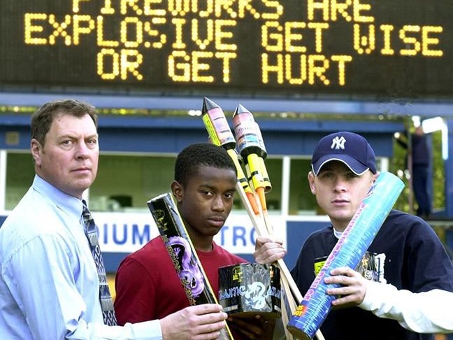Sheffield Wednesday players Derek Geary (right) and Leon Knight give out a firework saftey message at Hillsborough, pictured with Greg Ward (left) Sheffield Trading Standards Officer, October 28, 2002