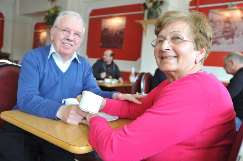 Customers Harry Hickey and Pam Clinch enjoy a final cuppa at Louis.