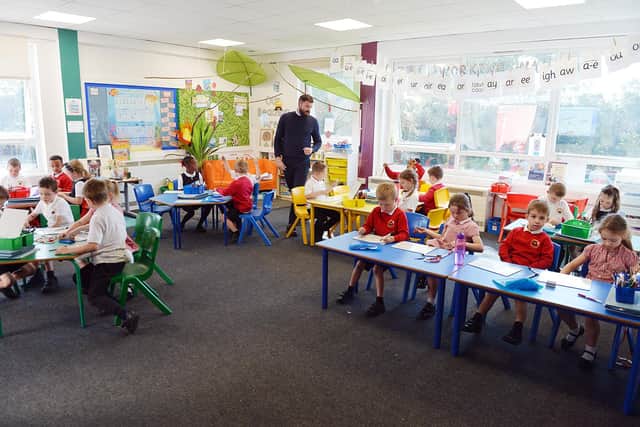 Children back at St Thomas of Canterbury. Year 2 Maths with Mr Robinson.