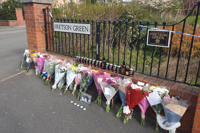 Flowers have been left close to the spot where a man was killed on the Manor estate in Sheffield yesterday