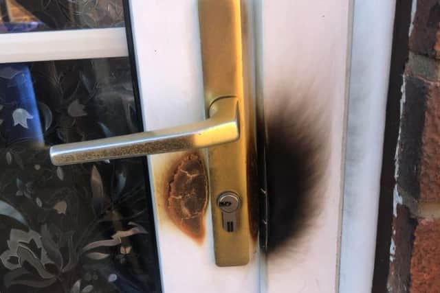 Damage to the door of a house on the Durlstone estate in Gleadless, Sheffield, after thieves attempted to break in using a blow torch
