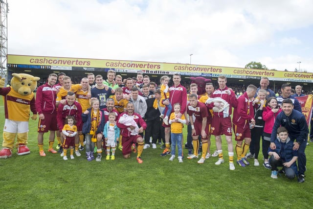 Motherwell players pose at the end of the Scottish Premiership play-off final second leg versus Rangers at Fir Park on May 31, 2015. (Photo by Jeff Holmes/Getty Images)