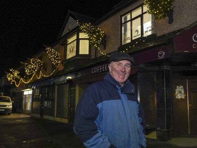 Chris Key from Key Homecare coordinated the light show at the suburb's shops. Picture Scott Merrylees