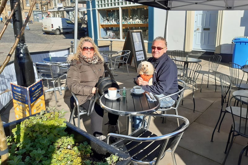 Jayne and Anthony Wellford, with their dog Champers, at the Olive Branch Cafe.
