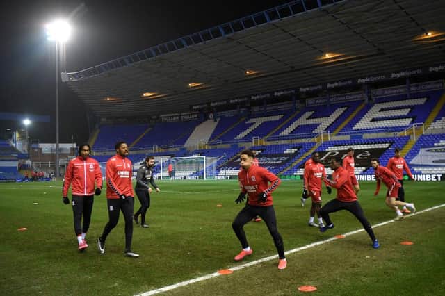 Middlesbrough players warm up ahead of their game against Coventry at St Andrew's.