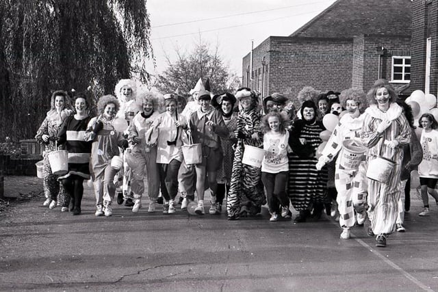 Mexborough students setting off on their fancy dress walk fir Children in Need in 1990.