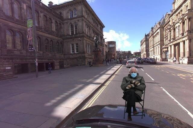 If Bernie is sitting on this street, which famous museum might he be visiting?
