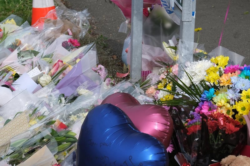 Floral tributes at the scene of a multiple murder in Killamarsh. Picture: Dean Atkins.