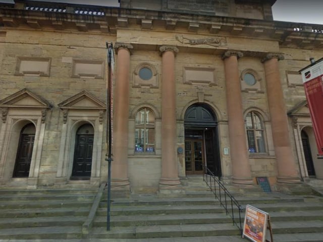 Galleries of Justice, Nottingham. Voted the most haunted building in the UK. The ghosts of men, women, and children hanged here for crimes as small as theft are said to continue walking the halls of this building.
