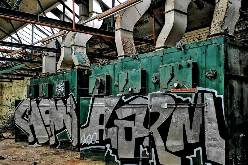 Graffiti artists have been active in the abandoned mill.