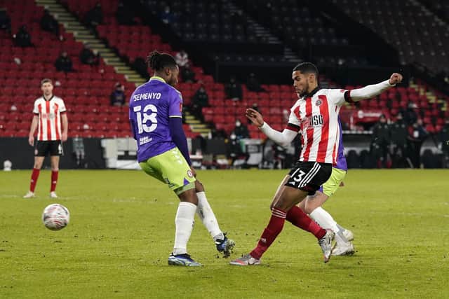Max Lowe in action for Sheffield United during their FA Cup win over Bristol City: Andrew Yates/Sportimage