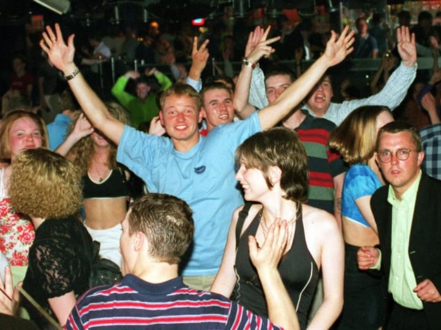 Revellers dancing in 1997
