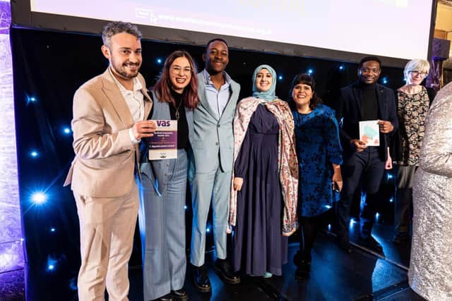 The Migration Matters Festival team accepting their award