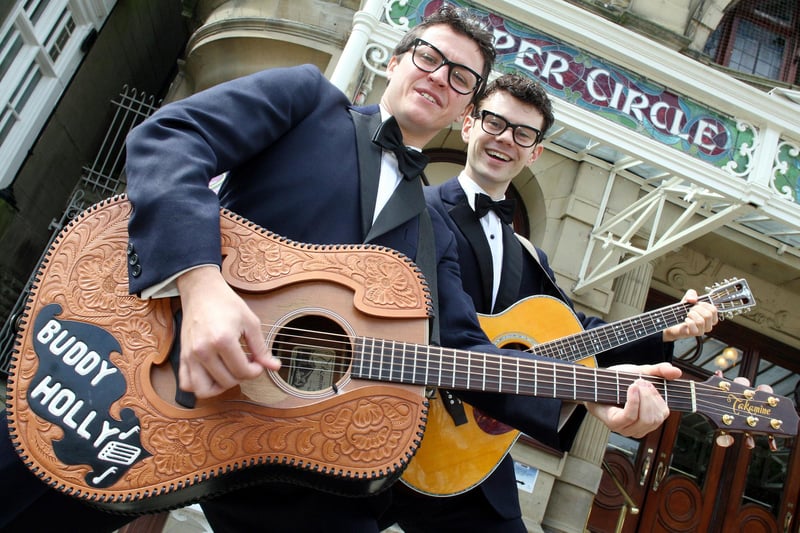 Dean Elliott and Matt Wycliffe give an impromptu performance outside the Buxton Opera House to promote The Buddy Holly Story in 2007