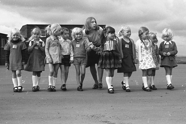 Mrs Hodson shows some of the starters round Quarry View Infants School in 1976.