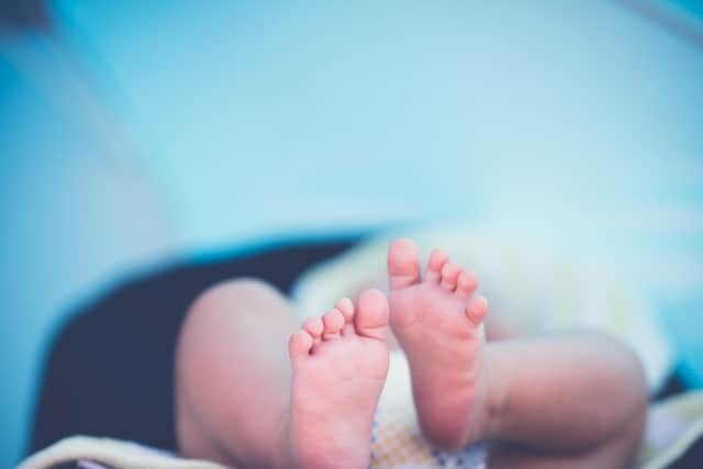 The baby was safeguarded after being found with its mother who was passed out in bed (stock image by Pexels from Pixabay)