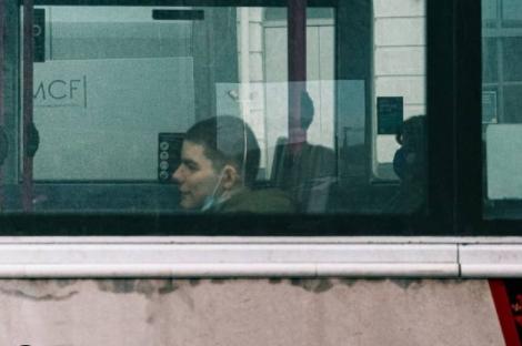 A gentleman on a bus.